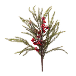 Artificial Christmas tree branch with red berries on a white background