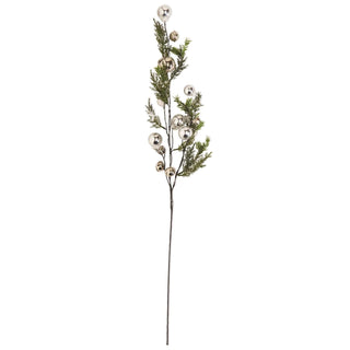 Decorative stem with green leaves and silver spherical ornaments on a white background