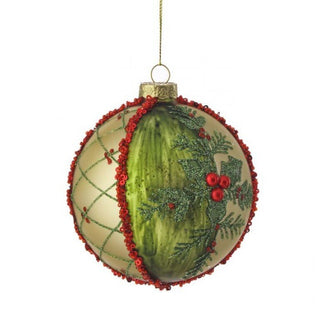 Decorative Christmas ornament resembling a watermelon with green and red details on a white background