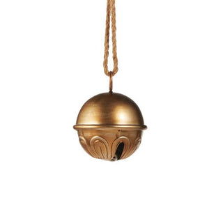 Bronze hanging bell with intricate design on a white background