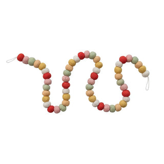 Colorful baby teething ring with multiple loops on a white background