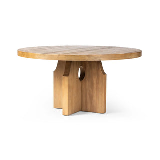 Full view of the Allandale Round Dining Table in natural reclaimed elm with a smooth, rounded tabletop and cutout pedestal base.