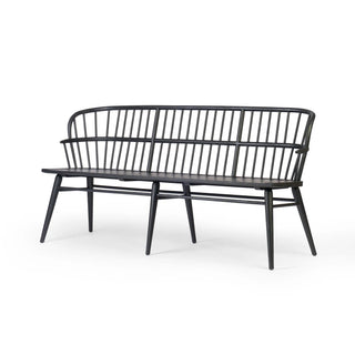 Full view of the Connor Bench, a modern Windsor-style dining bench crafted from black-finished solid ash.