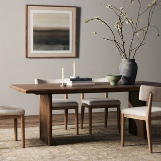 A stylish dining room setup featuring the Glenview Dining Table with modern decor and a cozy ambiance.