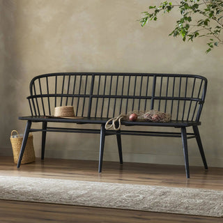 A stylish dining area featuring the Connor Bench, paired with a warm, neutral-toned setting.