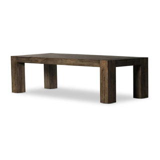 Full view of the Abaso Dining Table, a thick-cut oak veneer table with chunky squared legs and dovetail joinery.