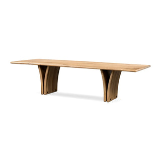 Full view of the Marcon Dining Table, a grand-scale reclaimed French oak table with tapered pedestal panels.