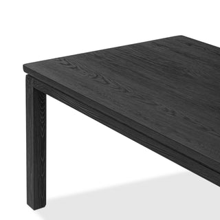 Angled view of the Oman Dining Table, showcasing its clean lines and modern aesthetic.