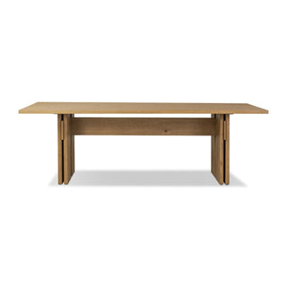 Straight-on view of the Railay Dining Table, showcasing its sturdy structure and contemporary design.