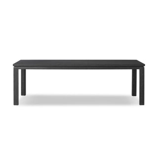 A side profile of the Oman Dining Table, highlighting its sleek and durable black wood construction.