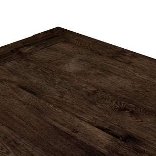 A detailed close-up of the Abaso Dining Table’s textured faux rustic oak finish, mimicking wormwood oak.