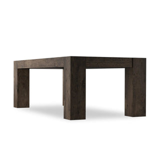 Close-up of the Abaso Dining Table’s thick squared leg, highlighting its durability and rustic appeal.