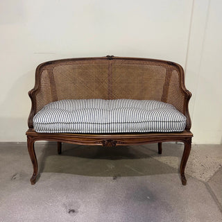 Antique French Caned Settee with Schumacher Mathis Ticking Cushion