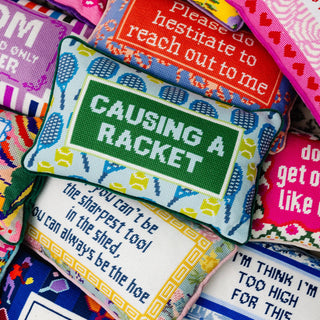 Causing A Racket Needlepoint Pillow