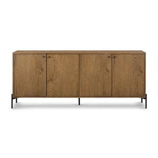 Front view of an amber oak veneer sideboard with four doors and a sleek black metal base.