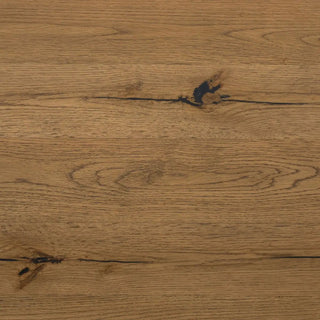 Close-up texture detail of amber oak veneer, highlighting the wood grain and natural knots.