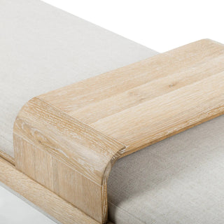 Detailed close-up of the Fawkes Bench’s white-washed oak sliding tray, perfect for holding books or drinks.