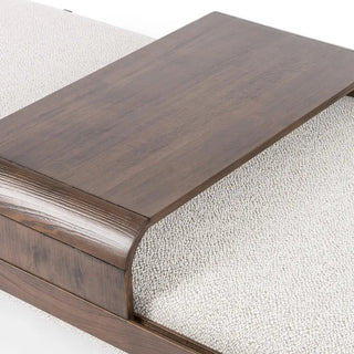 Close-up detail of the wooden center table on the solid beechwood rectangle ottoman.