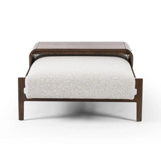 Side profile of a solid beechwood rectangle ottoman showcasing its minimalist design and sturdy wood frame.