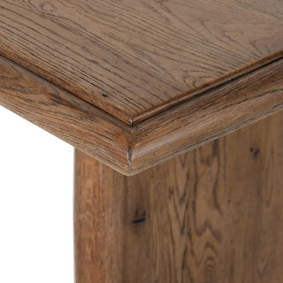 A detailed view of the Glenview Dining Table’s top surface, showing the smooth finish and natural imperfections.