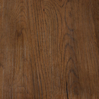 Angled view of the Glenview Dining Table, showcasing its modern rustic design and solid oak construction.