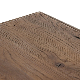 Close-up of the Glenview Dining Table’s double pedestal base, highlighting its sturdy support structure.