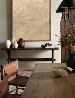 A warm and inviting dining room setup with the Glenview Dining Table, styled with modern-rustic elements.