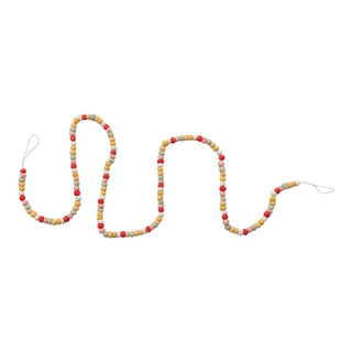 Colorful beaded snake toy on a white background