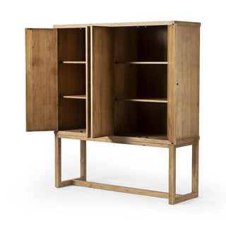 Worn oak cabinet with doors open, revealing interior shelving for storage.