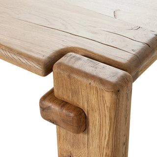 A detailed look at the top surface of the Marcia Dining Table, highlighting the intricate wood grain patterns.