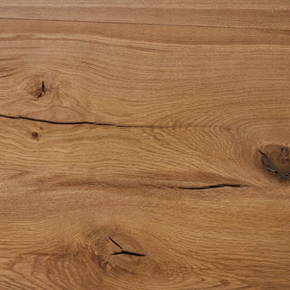 Close-up of the Marcia Dining Table’s wood grain and texture, highlighting its reclaimed French oak material.