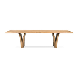 A side view of the Marcon Dining Table, showcasing its clean lines and sculptural woodwork.