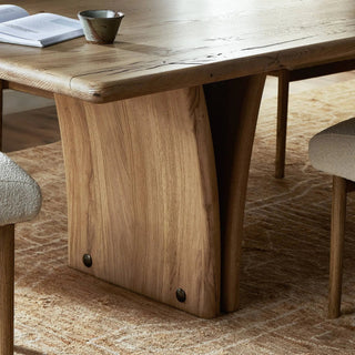 A detailed shot of the Marcon Dining Table’s expertly crafted wood joinery, highlighting its fine craftsmanship.