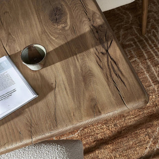 Close-up of the Marcon Dining Table’s tabletop edge, displaying its smooth and refined finish.