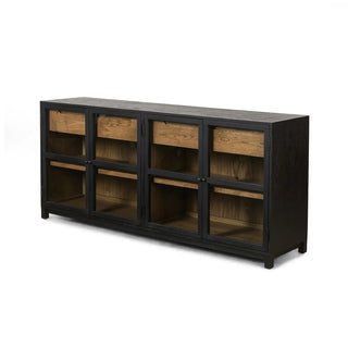 Angled perspective of a black drifted oak sideboard showcasing its sleek design and rich wood grain texture.