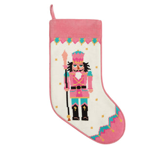 Christmas stocking with a nutcracker design on a white background