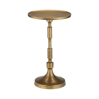 Luxury brass accent table with round tray top and sculpted pedestal base – perfect for elegant interiors.