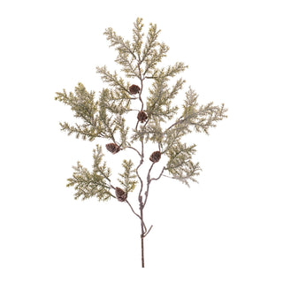 Artificial evergreen branch with pine cones on a white background