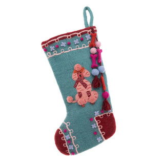 Decorative Christmas stocking with a pink dog design on a white background