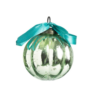 Glass ornament with a teal ribbon on a white background