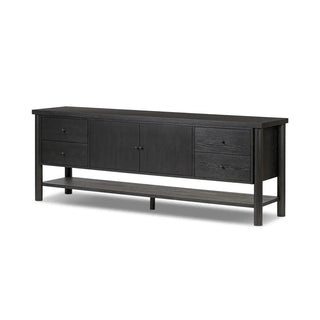 Angled perspective of a black ebony oak media console showcasing its elegant lines and smooth finish.