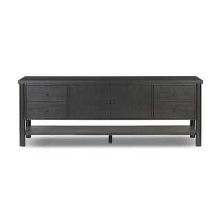 Front view of a black media console crafted from ebony oak veneer, featuring a sleek and modern design.