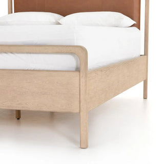 Zoomed-in shot of the queen bed’s curved oak legs, offering durability and a sleek, modern aesthetic.