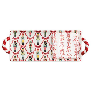Christmas-themed tray with nutcrackers and candy canes on a white background