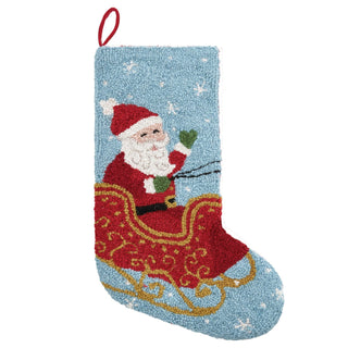 Christmas stocking with Santa Claus design on a blue background