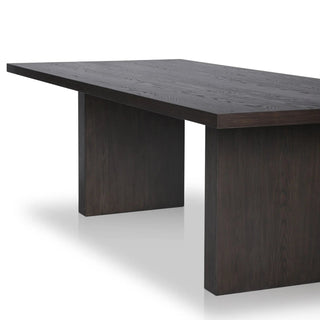 Close-up of the Torrington Dining Table’s waterfall-style leg design, emphasizing its seamless and modern construction.