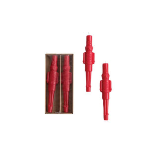 Red candle sticks with packaging on a white background