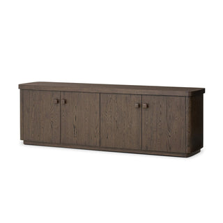 Angled view of a rustic brown oak sideboard, showcasing its warm wood grain and minimalist aesthetic.