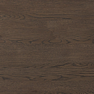 Close-up of the rich wood grain and texture on the rustic brown oak sideboard.