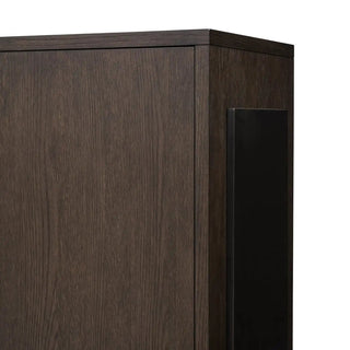 Close-up of the handle design on a modern black oak sideboard, featuring a matte black finish.